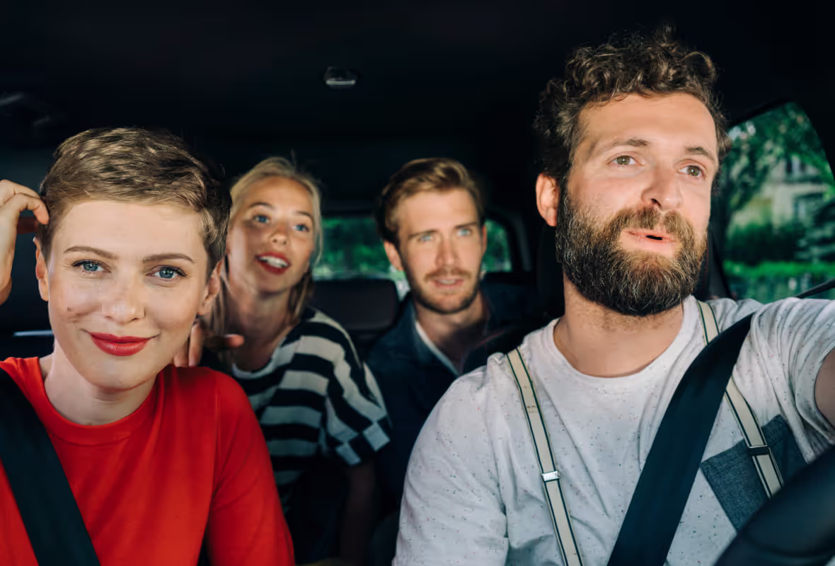 Friend group in car